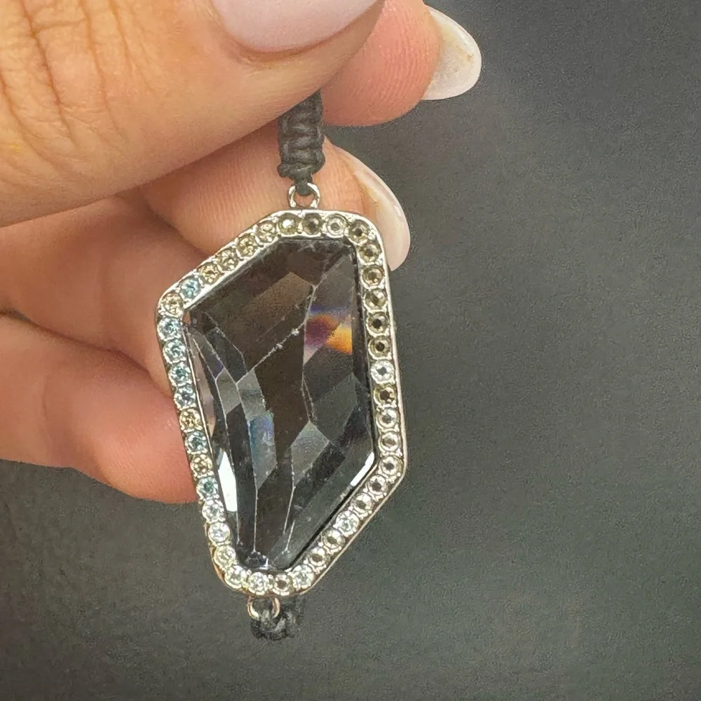Swarovski silver tone on adjustable size cord bracelet